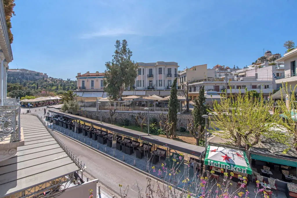 Neoclassical building with rooftop and panoramic landmark views