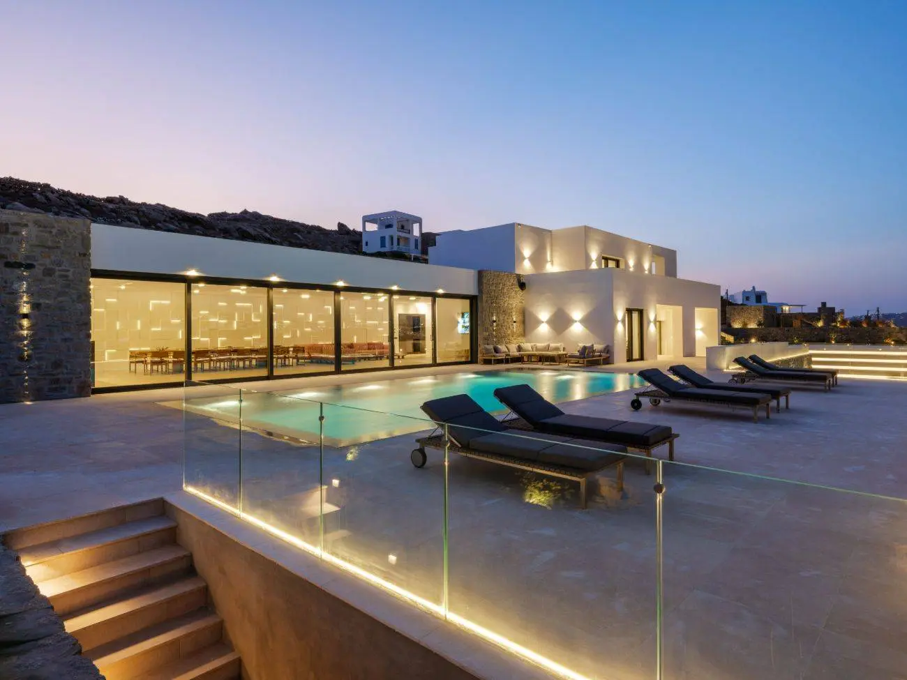 Contemporary ultra-luxury estate in Mykonos with helipad, dual pools & panoramic Aegean views