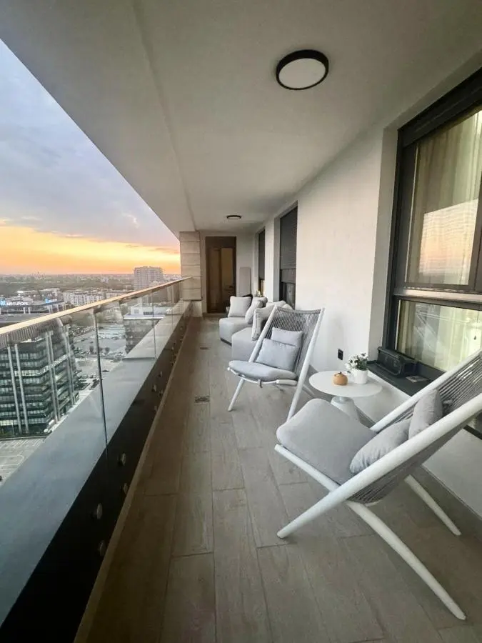 Elegant Four-Bedroom Apartment with Panoramic Views in the Wellport Residential Complex