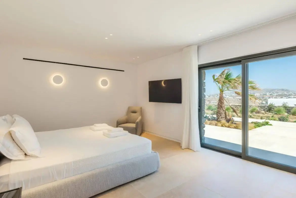 Contemporary ultra-luxury estate in Mykonos with helipad, dual pools & panoramic Aegean views