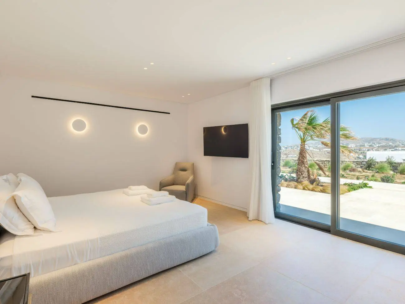 Contemporary ultra-luxury estate in Mykonos with helipad, dual pools & panoramic Aegean views