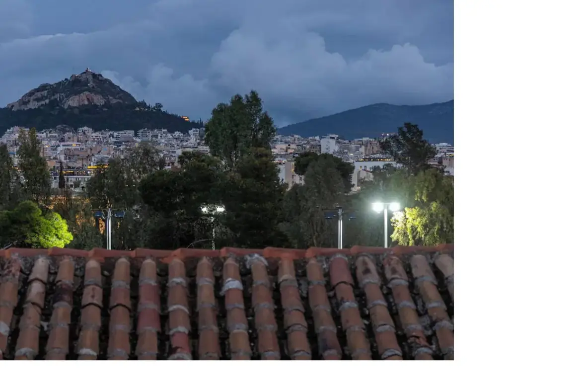 Neoclassical building with rooftop and panoramic landmark views
