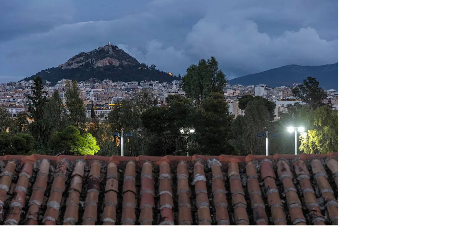 Neoclassical building with rooftop and panoramic landmark views