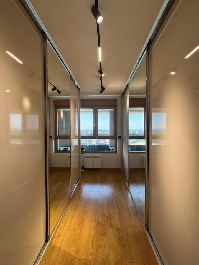 Elegant Four-Bedroom Apartment with Panoramic Views in the Wellport Residential Complex