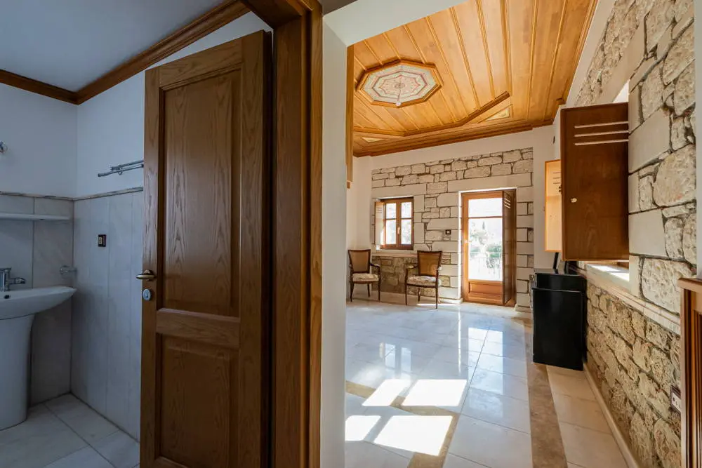 Historic waterfront property with boutique hotel development potential in Agios Nikolaos, Mani