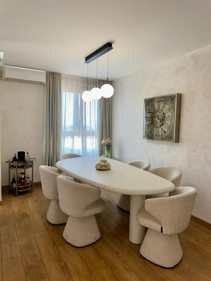 Elegant Four-Bedroom Apartment with Panoramic Views in the Wellport Residential Complex