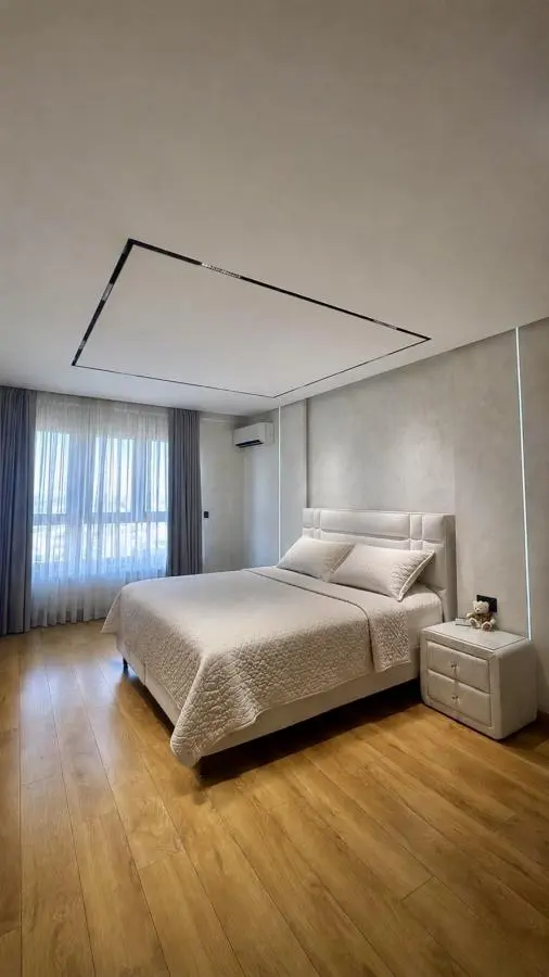 Elegant Four-Bedroom Apartment with Panoramic Views in the Wellport Residential Complex