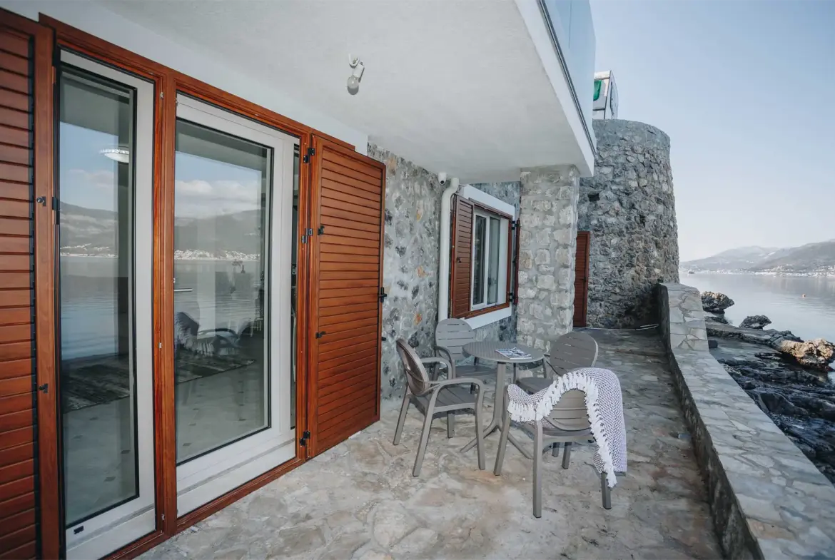 For sale seafront stone house with three apartments in Krasici