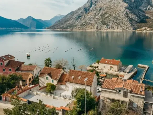 Reconstructed stone villa on the first line to the sea in Ljutoja, Kotor
