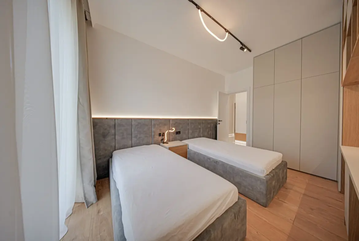 Luxurious and fully furnished two-bedroom apartment in a new gated complex for sale