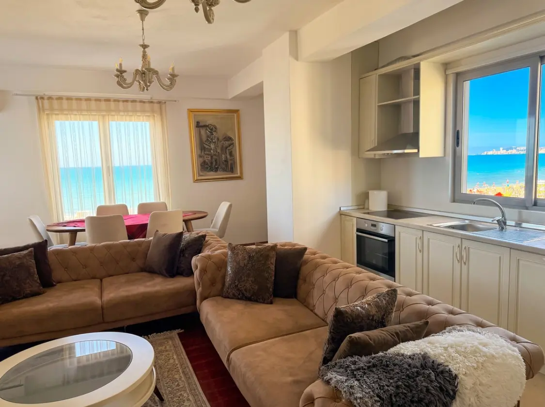 firefly-gemini-flash-enhance-brightness-clear-and-sunny-sky- Beachfront Two-Bedroom Apartment for Sale in Durrës