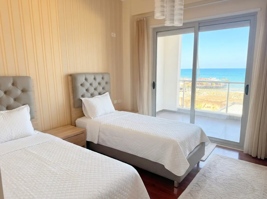 firefly-gemini-flash-enhance-brightness-clear-sunny-sky-make Beachfront Two-Bedroom Apartment for Sale in Durrës