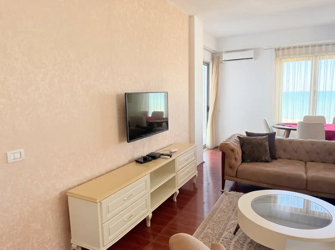 firefly-gemini-flash-enhance-brightness-remove-the-cloth-han-2 Beachfront Two-Bedroom Apartment for Sale in Durrës