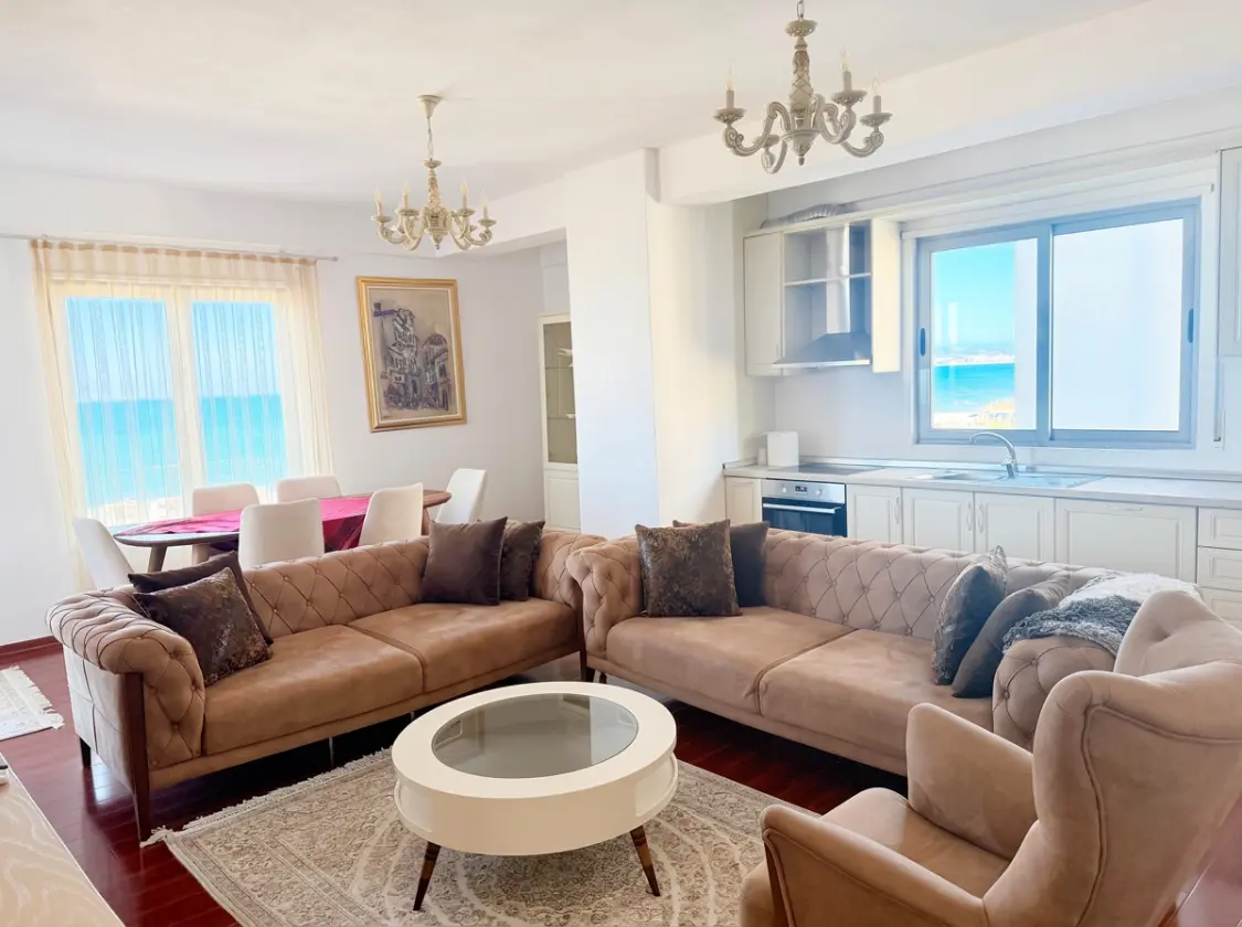 firefly-gemini-flash-enhance-brightness-remove-the-cloth-han Beachfront Two-Bedroom Apartment for Sale in Durrës
