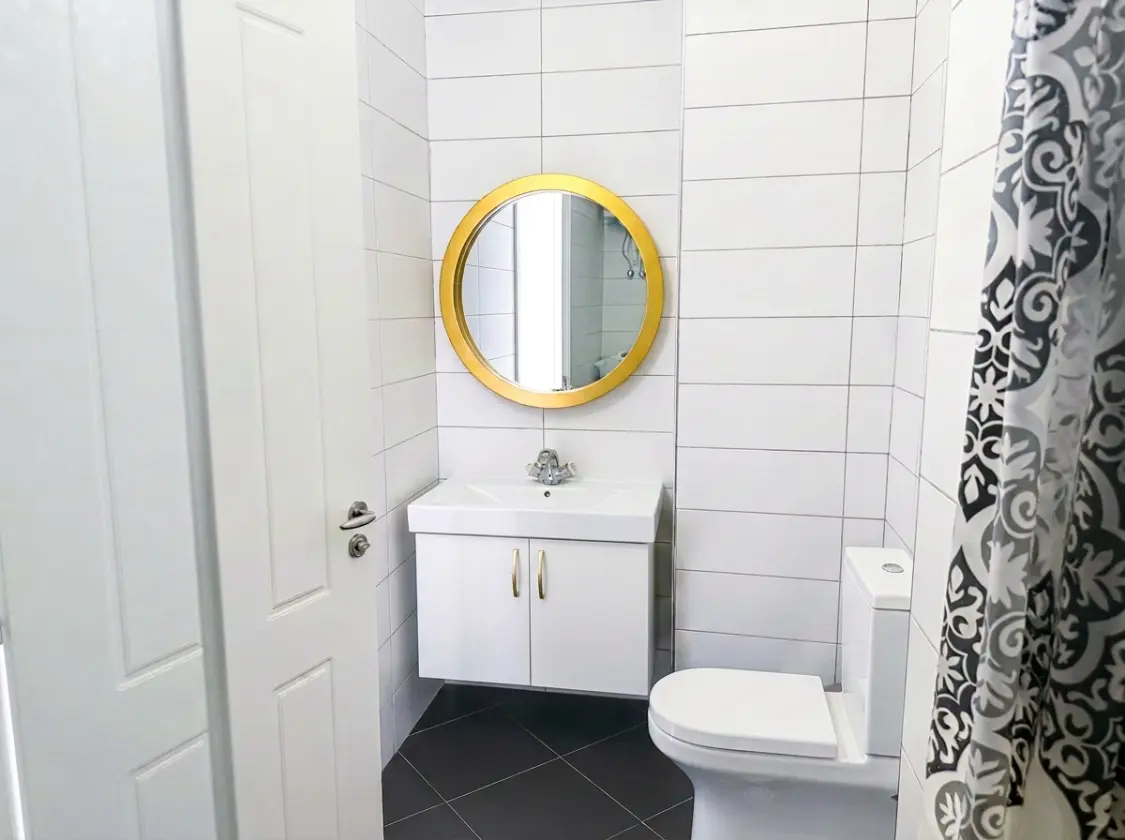 firefly-gemini-flash-put-a-door-at-the-cabinet-on-the-sink-2 Beachfront Two-Bedroom Apartment for Sale in Durrës