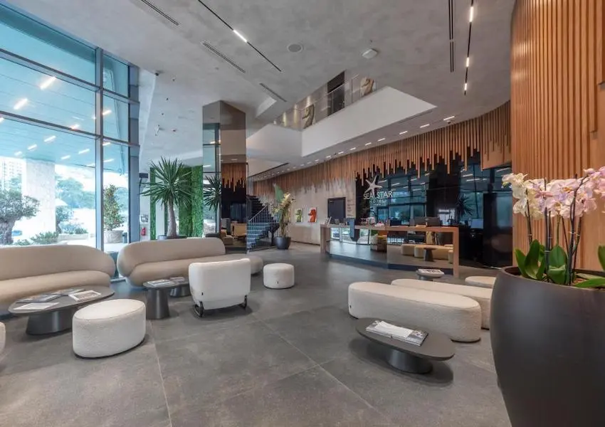 Luxury apartments in a condo hotel on the seafront, Becici