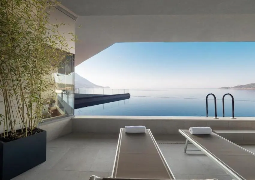 Luxury apartments in a condo hotel on the seafront, Becici