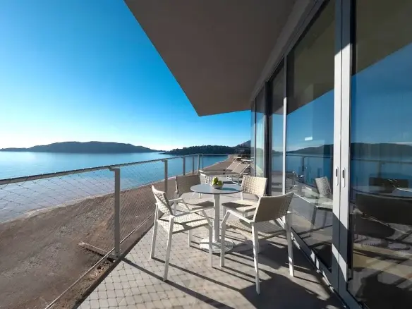 Luxury apartments in a condo hotel on the seafront, Becici